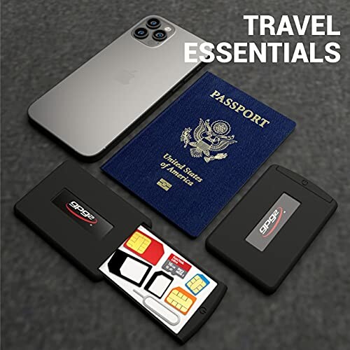 Flat lay of travel essentials including a smartphone, passport, and SIM card holder.